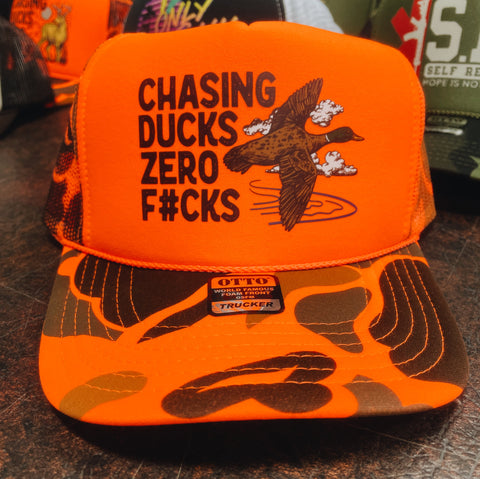 Chasing Ducks Trucker Hats
